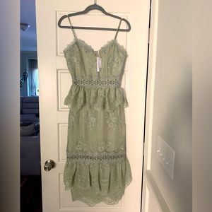 Never worn V. Chapman dress / color: sage / size: 2